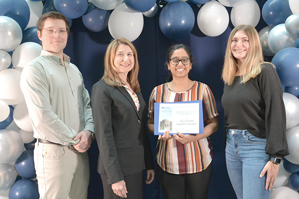 Sai Venkata Gayathri Ayyagari receiving the Howard O. and Jean Beaver Graduate Studies Award