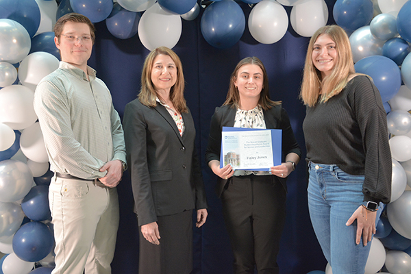 Haley Jones receiving the Howard O. and Jean Beaver Graduate Studies Award