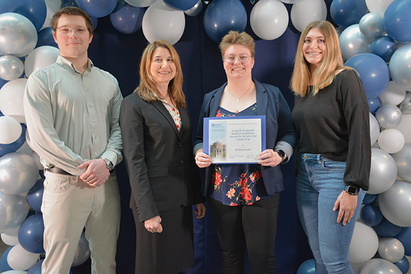 Brittney Hauke receiving the  Coppola Graduate Student Award for Student Service and Leadership
