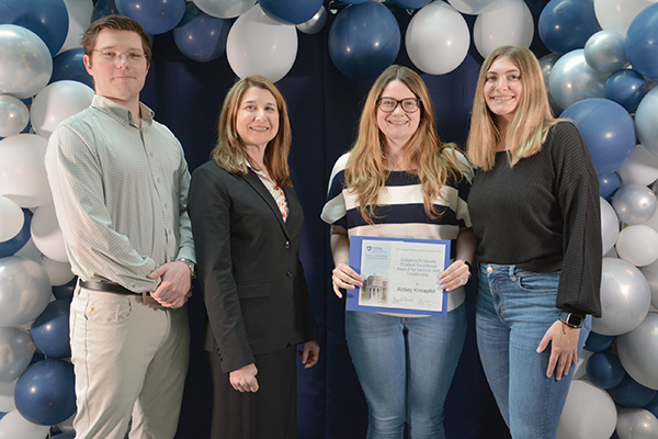 Abbey Knoepfel receiving the Coppola Graduate Student Award for Student Service and Leadership