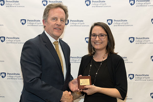 Allison Beese receiving award from Dean Kump