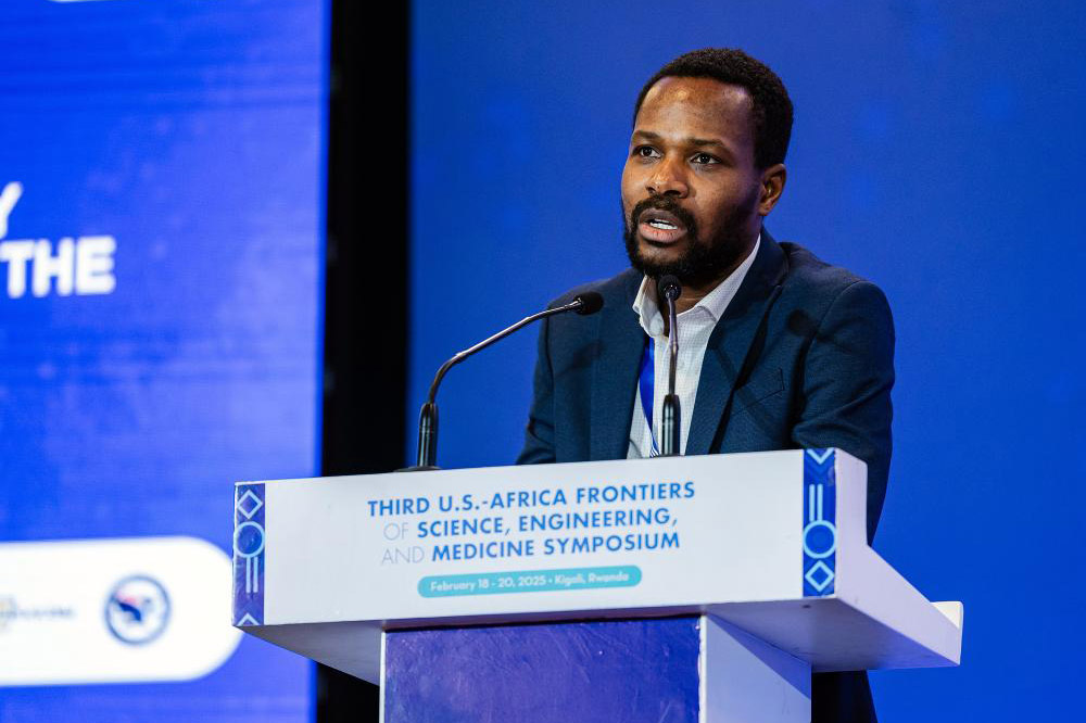 Nutifafa Doumon standing at podium