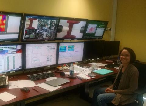 Allison Beese, assistant professor of materials sciences and engineering, sits in front of the control panel