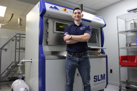 Joseph Sinclair at Imperial Machine & Tool Co. with a SLM 280HL Metal 3D-Printer.