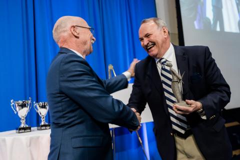 James Adair receives the 2018 Invent Penn State "Inventor of the Year" award from Vice President for Research Neil Sharkey  Imag