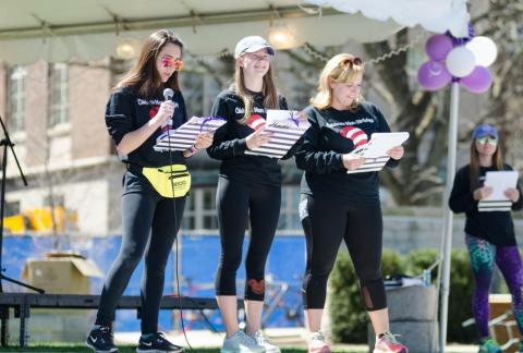 Courtney Mensch (left), materials science and engineering student, gives a speech at the 2017 Relay For Life with overall chairs